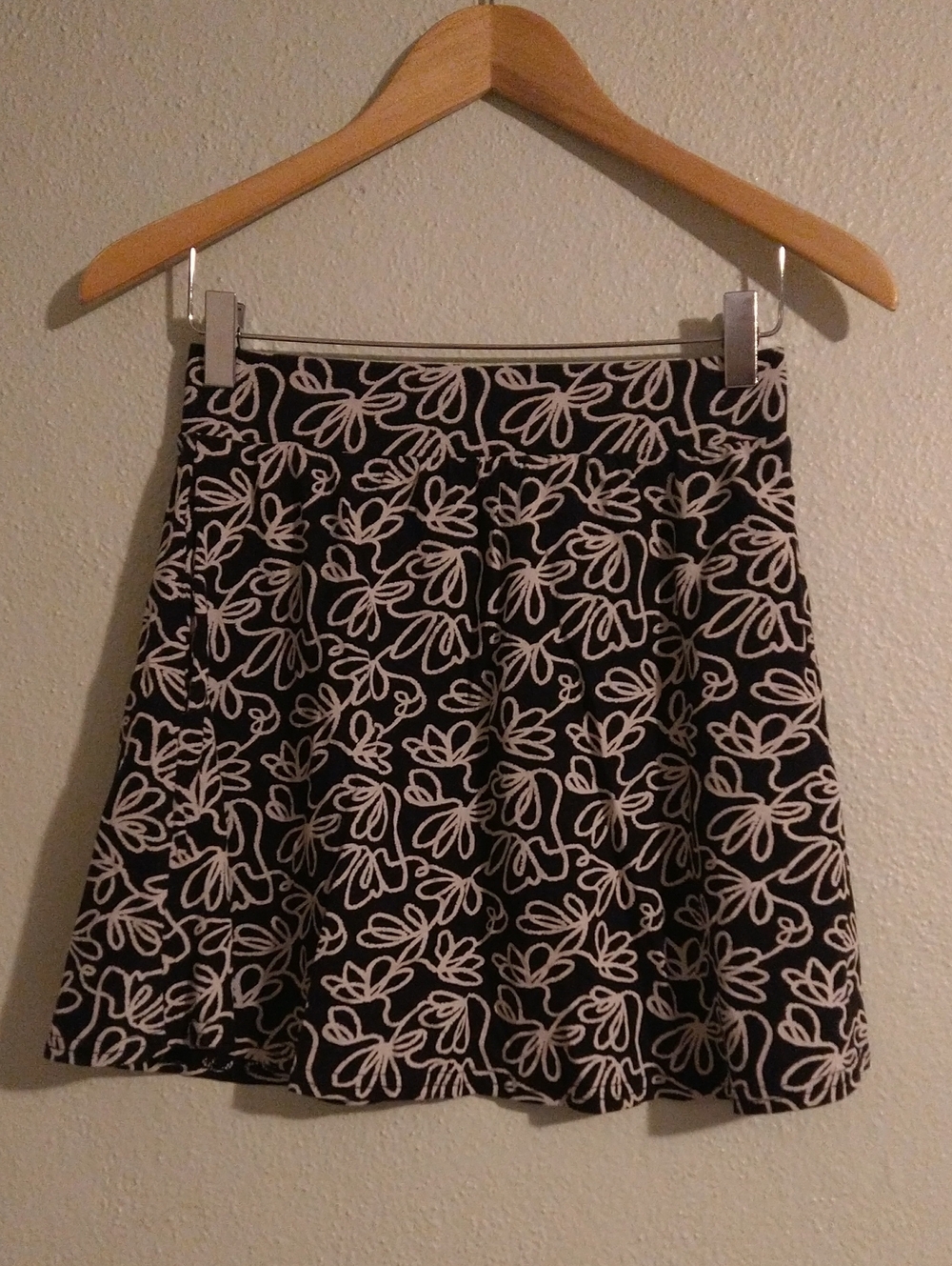 Pact | black fit and flare mini skirt, size s.